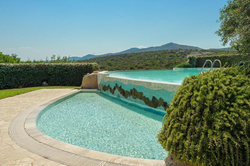 Villetta d'Arancia a Marinella - Lussuoso appartamento con piscina