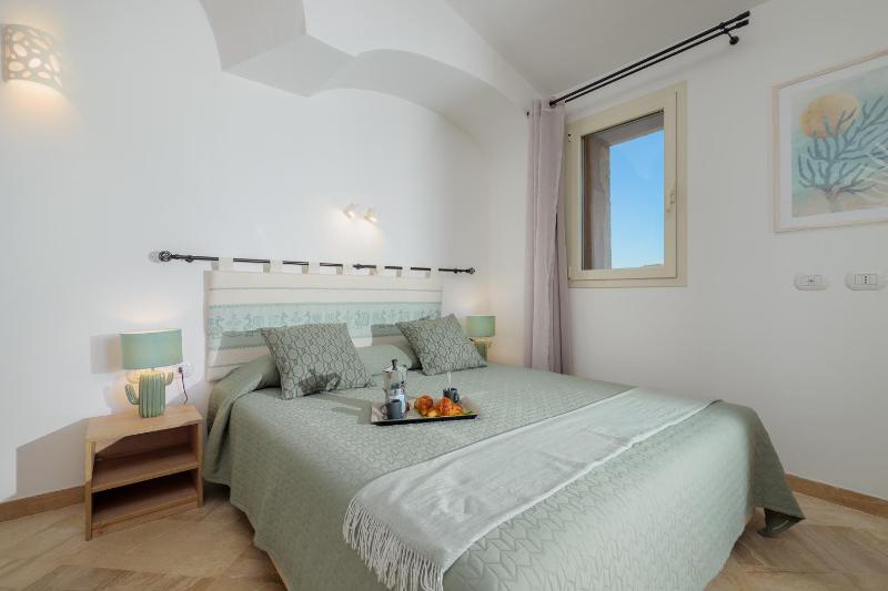 Appartamento Botanico a Marinella - Lussuosa piscina